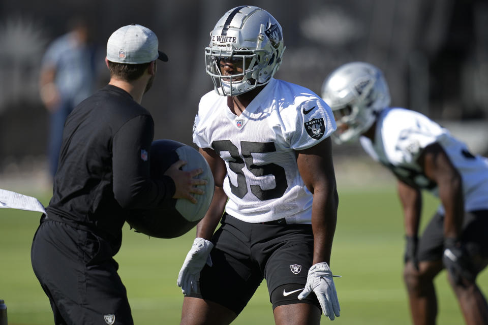 Las Vegas Raiders' Zamir White practices during NFL football training camp, Thursday, July 21, 2022, in Henderson, Nev. (AP Photo/John Locher)