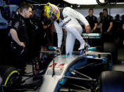 Formula One F1 - Brazilian Grand Prix 2017 - Sao Paulo, Brazil - November 10, 2017. Mercedes' Lewis Hamilton of Britain sits in his car during first practice. REUTERS/Paulo Whitaker