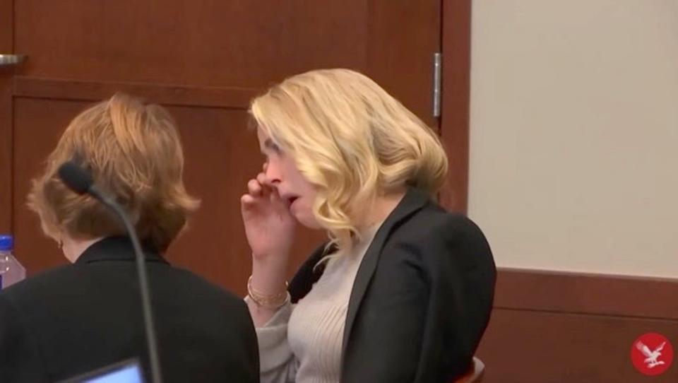 Amber Heard wipes away tears as she listens to Raquel Pennington’s testimony (The Independent)