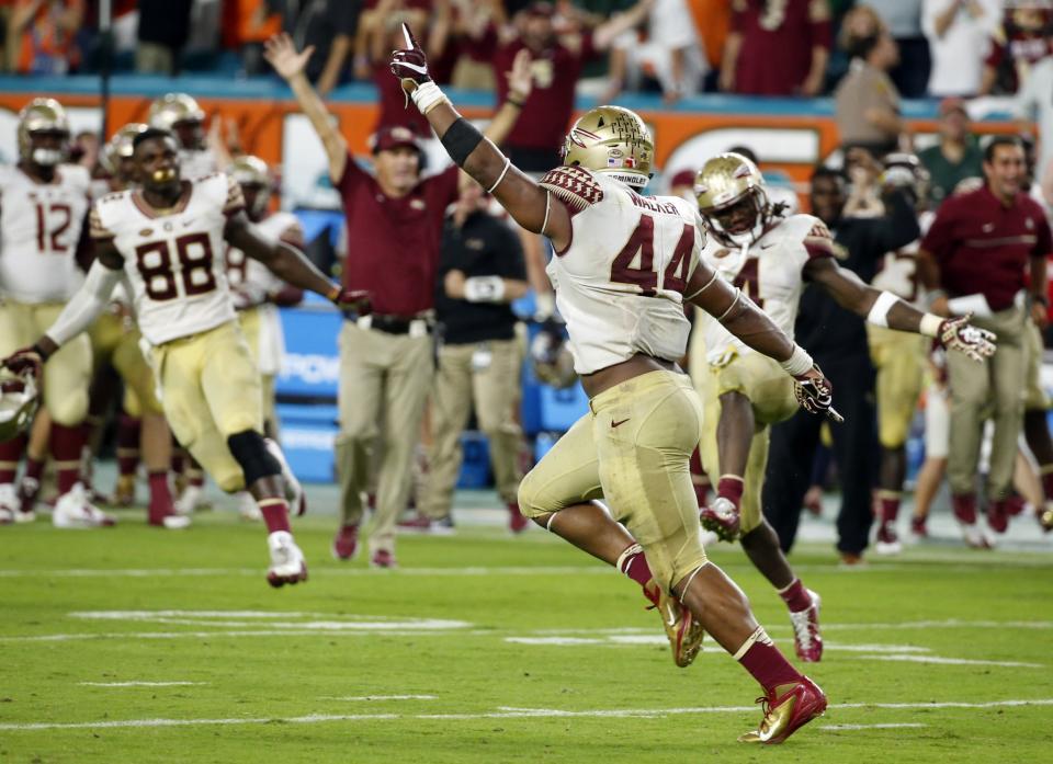 Florida State defensive end DeMarcus Walker (44) celebrates after blocking an extra point. (AP Photo/Wilfredo Lee)