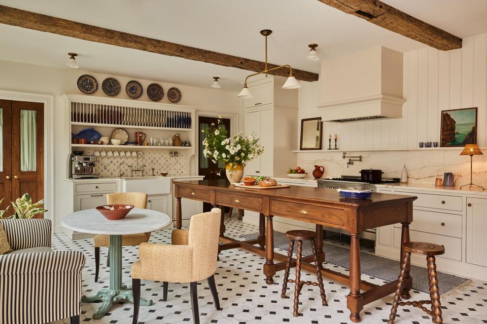 farmhouse island with black and white kitchen floors