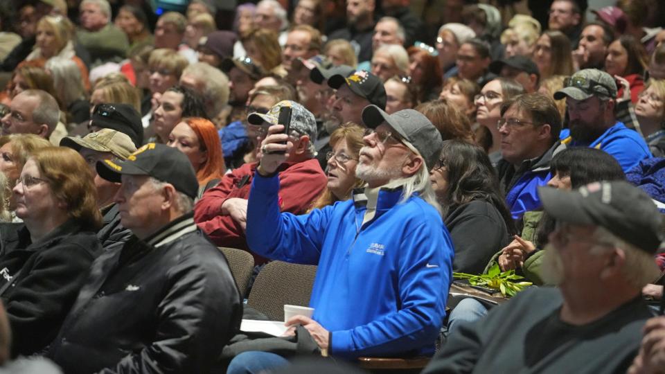 More than 2,500 people attended  a Justice for East Palestine event in the East Palestine High School auditorium Friday.