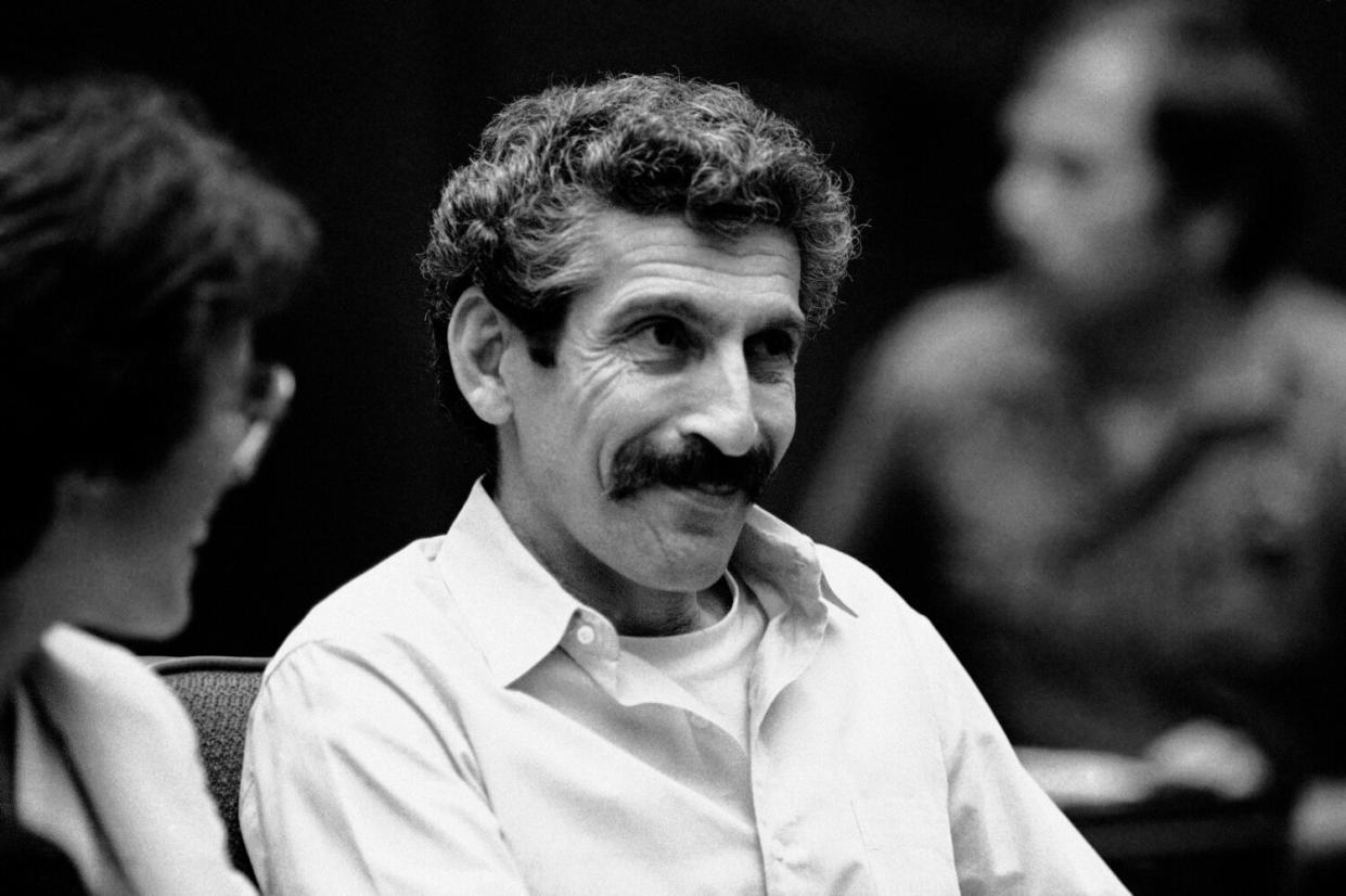 black-and-white photo of a man in court