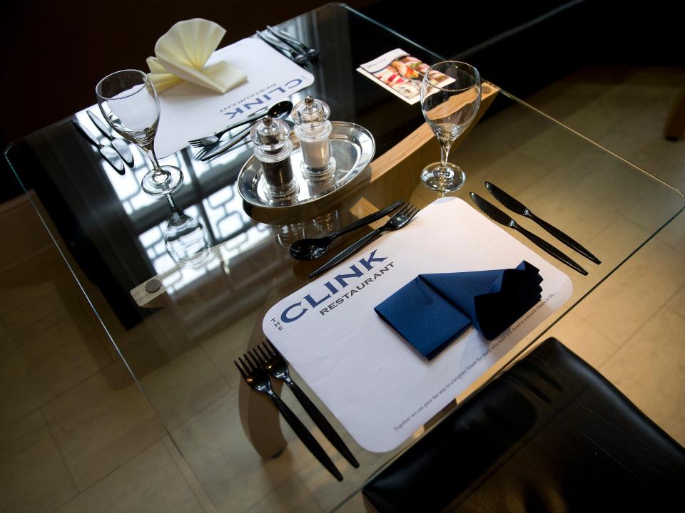 place setting on a table at the clink restaurants in brixton prison