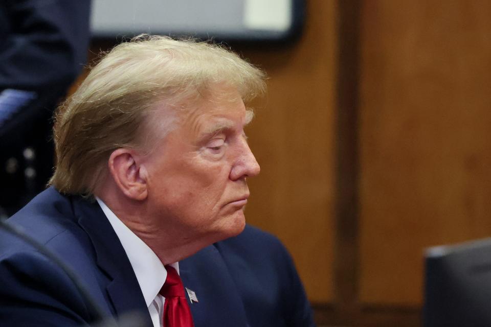 Republican presidential candidate, former U.S. President Donald Trump attends a pre-trial hearing at Manhattan Criminal Court on February 15, 2024 in New York City. Trump was charged with 34 counts of falsifying business records last year, which prosecutors say was an effort to hide a potential sex scandal, both before and after the 2016 presidential election. Judge Juan Manuel Merchan is expected to rule whether the trial will begin as scheduled on March 25. (Photo by Brendan McDermid-Pool/Getty Images)