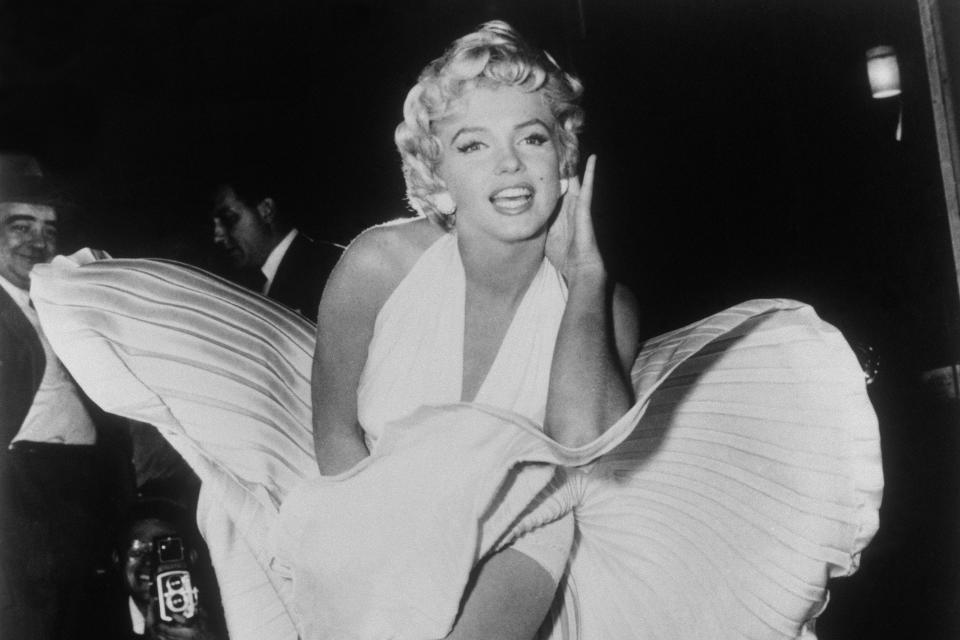 FILE - In this Sept. 9, 1954 file photo, Marilyn Monroe poses over the updraft of a New York subway grate while filming "The Seven Year Itch" New York. President Donald Trump has signed resolutions renaming two post offices in the Los Angeles area in honor of Monroe and rock 'n' roll legend Ritchie Valens. (AP Photo/Matty Zimmerman, File)