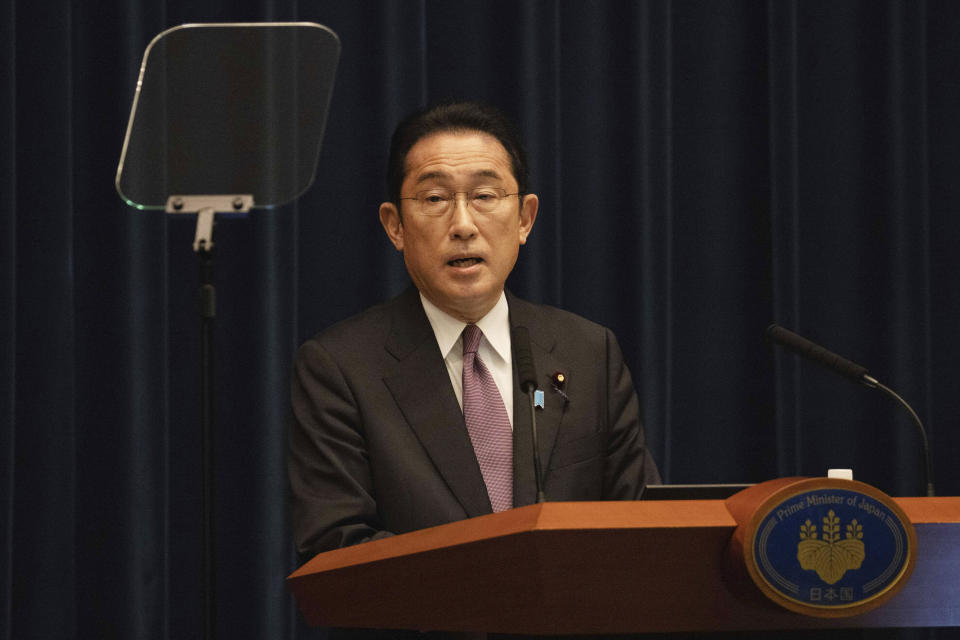 Japanese Prime Minister Fumio Kishida speaks during a news conference in Tokyo, Wednesday, March 16, 2022. Kishida on Wednesday announced plans to fully lift coronavirus restrictions on March 21 as new infections driven by the highly contagious omicron variant slow. (Stanislav Kogiku/Pool Photo via AP)