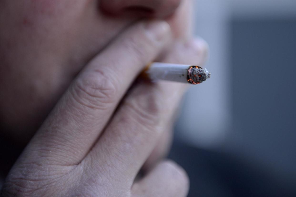 The NHS has to ensure that tobacco dependence treatment is provided for every smoker using the health service, medics have said: PA Wire/PA Images