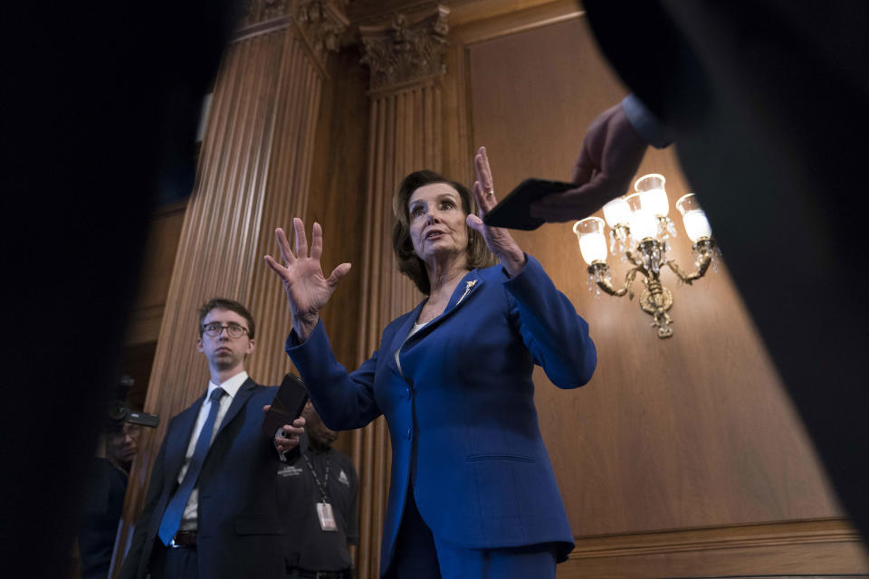 Pelosi, addressing the media on March 27, has been at the center of a rare burst of bipartisan legislation | Sarah Silbiger—Bloomberg/Getty Images