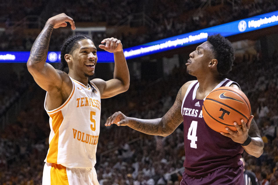 Tennessee guard Zakai Zeigler (5) reacts to fans after stealing the ball from Texas A&M guard Wade Taylor IV (4) and scoring on the play during the second half of an NCAA college basketball game Saturday, Feb. 24, 2024, in Knoxville, Tenn. (AP Photo/Wade Payne)