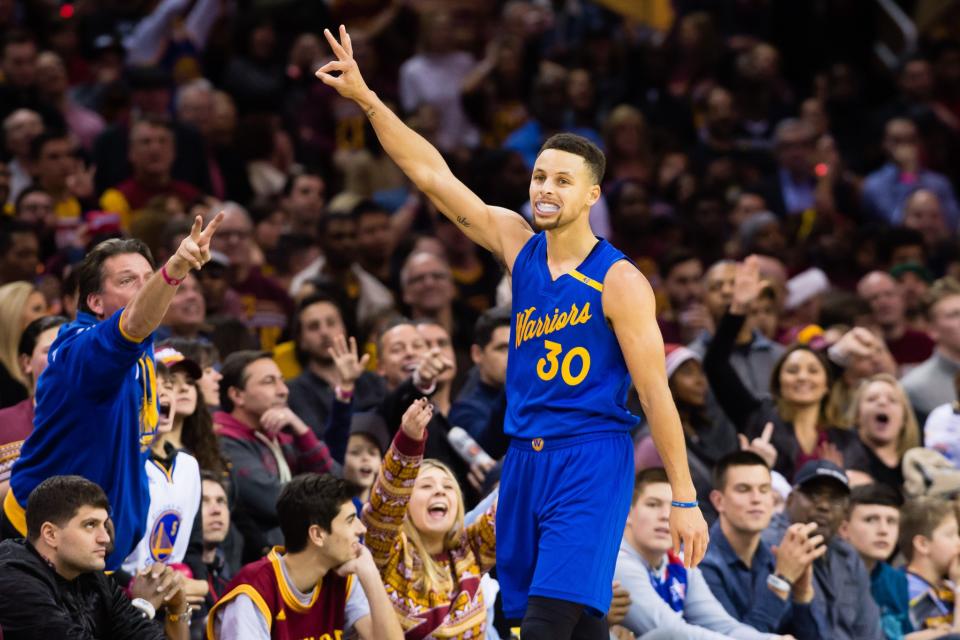 Stephen Curry shows us all the magic number. (Getty Images)