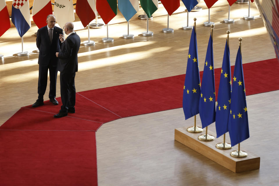 European Council President Charles Michel, right, speaks with author of the High-Level Report on the future of the Single Market, Enrico Letta as they arrive for an EU summit in Brussels, Thursday, April 18, 2024. European Union leaders vowed on Wednesday to ramp up sanctions against Iran as concern grows that Tehran's unprecedented attack on Israel could fuel a wider war in the Middle East. (AP Photo/Omar Havana)