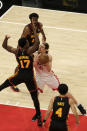 Atlanta Hawks forward Onyeka Okongwu (17) blockw Houston Rockets forward Kelly Olynyk (41) during the second half of an NBA basketball game on Sunday, May 16, 2021, in Atlanta. (AP Photo/Ben Gray)