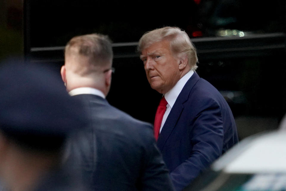Former U.S. President Donald Trump arrives at Trump Tower, after his indictment by a Manhattan grand jury following a probe into hush money paid to porn star Stormy Daniels, in New York City, U.S April 3, 2023.  REUTERS/David Dee Delgado