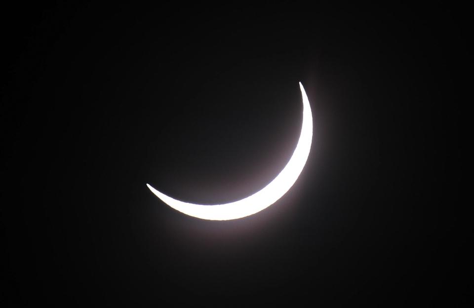 PALM COVE, AUSTRALIA - NOVEMBER 14: Near totality is seen during the solar eclipse at Palm Cove on November 14, 2012 in Palm Cove, Australia. Thousands of eclipse-watchers have gathered in part of North Queensland to enjoy the solar eclipse, the first in Australia in a decade. (Photo by Ian Hitchcock/Getty Images)