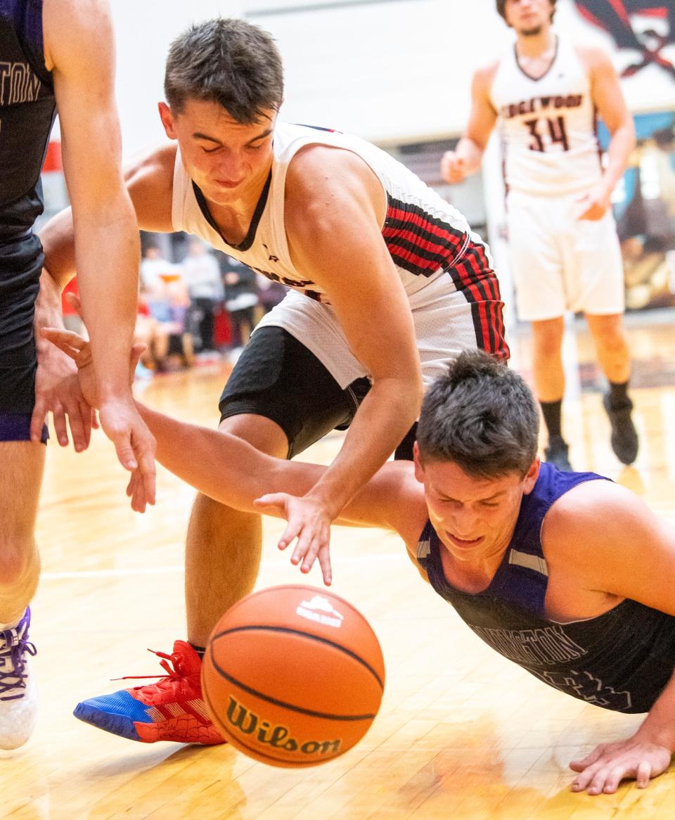 Edgewood's Xzander Hammonds (2) goes after a loose ball during the Bloomington South versus Edgewood boys basketball game at Edgewood High School on Tuesday, Nov. 22, 2022.