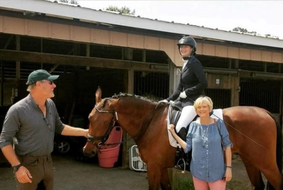 Michael Barisone with Lauren Kanarek, on horseback, in 2018.   Barisone excelled at dressage — training horses to seemingly dance. He was considered one of the best coaches in the world. / Credit: Instagram