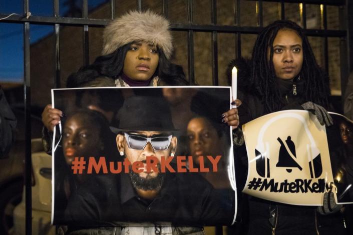 #MuteRKelly supporters protest outside R. Kelly&#39;s studio in Chicago in 2019.
