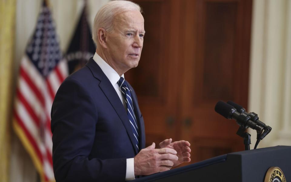  US President Joe Biden speaks during the first formal press conference of his presidency in the East Room of the White House - EPA