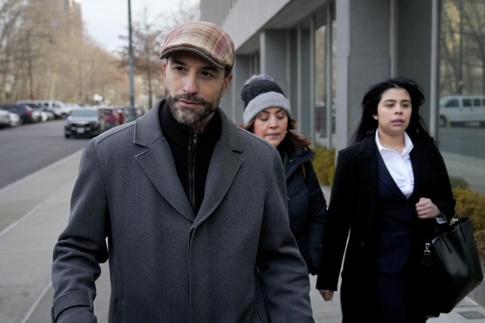 Cesar De Castro, attorney for Genaro Garcia Luna, Mexico's former top security official, arrives to Federal court in Brooklyn, Tuesday, Jan. 17, 2023, in New York. Luna goes on trial on charges of helping the Sinaloa Cartel traffic drugs and protect them from capture while he was serving as Mexico’s top security official. (AP Photo/John Minchillo)