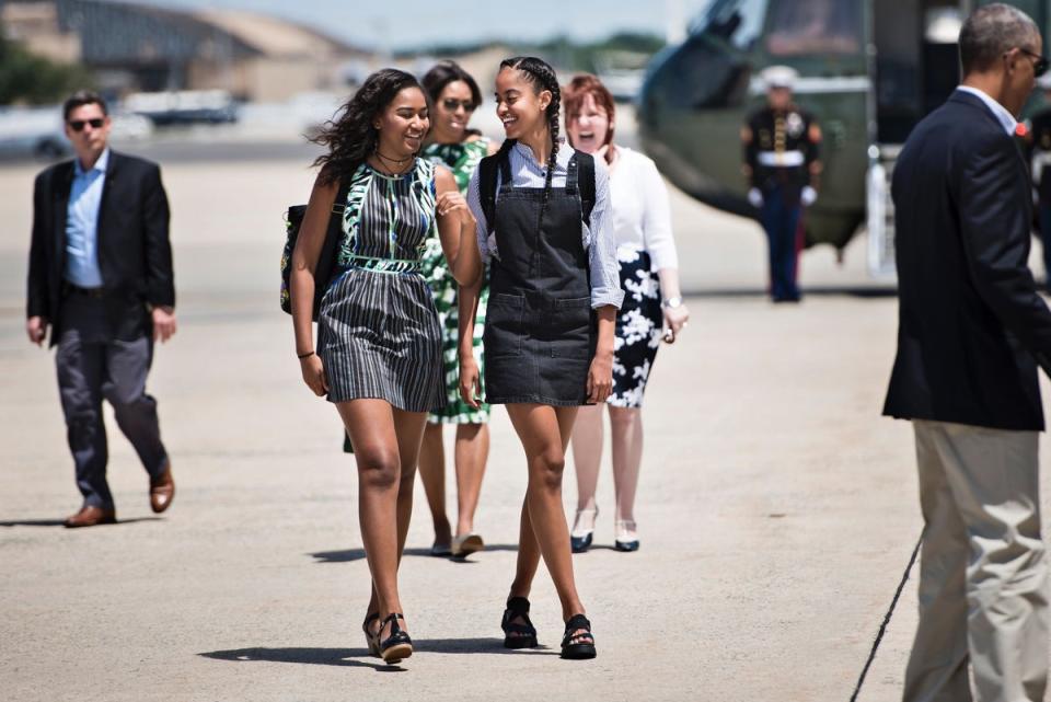 Sasha (left) and Malia Obama faced high levels of scrutiny while growing up and attending college in the age of social media (AFP via Getty Images)