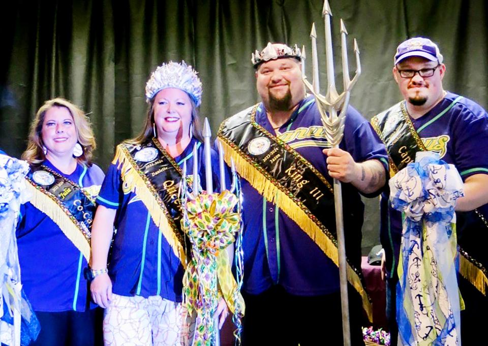 Krewe of Oceanus III newly crowned royals:
Co-Captain Julie Gill, Queen Danielle Driver-Rousell, King Jason DeLoach and Captain Parker Ward at the krewe's coronation event.