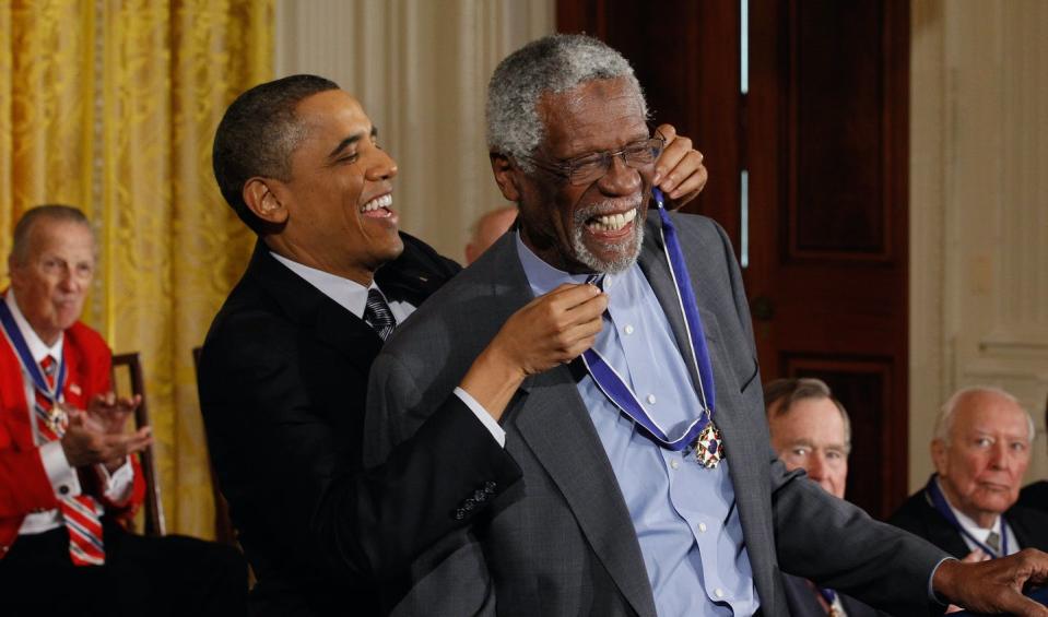 U.S. President Barack Obama presents Bill Russell the 2010 Medal of Freedom on Feb. 15, 2011. <a href="https://www.gettyimages.com/detail/news-photo/president-barack-obama-presents-basetball-hall-of-fame-news-photo/109136573?adppopup=true" rel="nofollow noopener" target="_blank" data-ylk="slk:Chip Somodevilla/Getty Images;elm:context_link;itc:0;sec:content-canvas" class="link ">Chip Somodevilla/Getty Images</a>