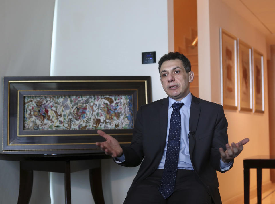 Nizar Zakka, a Lebanese citizen and permanent U.S. resident who was released in Tehran after nearly four years in jail on charges of spying, speaks during an interview with The Associated Press at a hotel in Dbayeh, north of Beirut, Lebanon, Wednesday, June 12, 2019. Zakka, an information technology expert, who was detained in Iran in September 2015 while trying to fly out of Tehran called on President Donald Trump to "get back your hostages" from Iran. He was sentenced to 10 years in prison after authorities accused him of being an American spy - allegations vigorously rejected by Zakka, his family and associates. (AP Photo/Bilal Hussein)