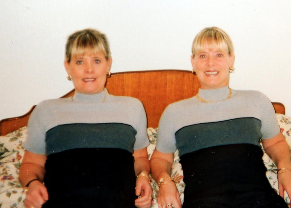The sisters wearing identical outfits in 2002 when they were aged 48. (SWNS)