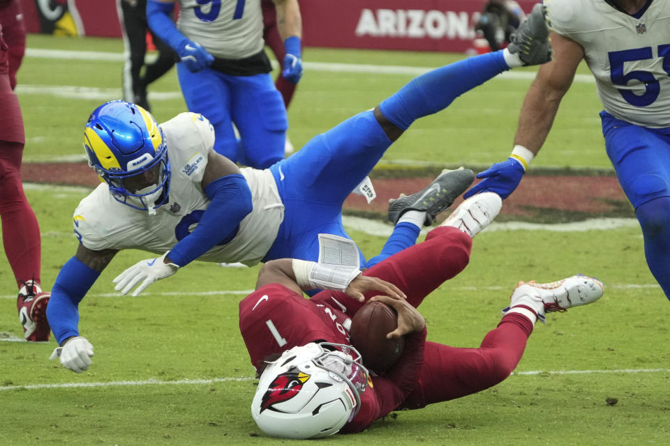 Los Angeles Rams safety Kamren Curl (3) tackles Arizona Cardinals linebacker Kyzir White (7) during the second half of an NFL football game, Sunday, Sept. 15, 2024, in Glendale, Ariz. (AP Photo/Rick Scuteri)