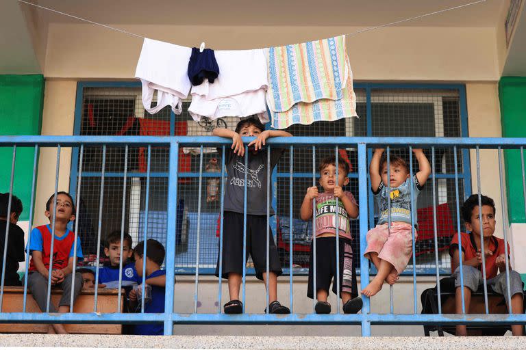 Los niños de palestinos refugiados en una escuela administrada por las Naciones Unidas