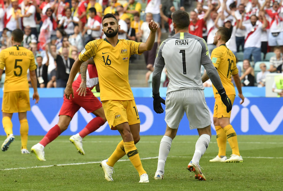 <p>Aziz Behich looks disappointed after Guerrero doubled Peru’s lead to all but send Australia packing from the tournament </p>