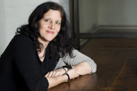 This April 16, 2014 photo shows Pulitzer Prize and Polk Award winner Laura Poitras in New York to promote her documentary film "1971," premiering Friday at the Tribeca Film Festival. (Photo by Charles Sykes/Invision/AP)