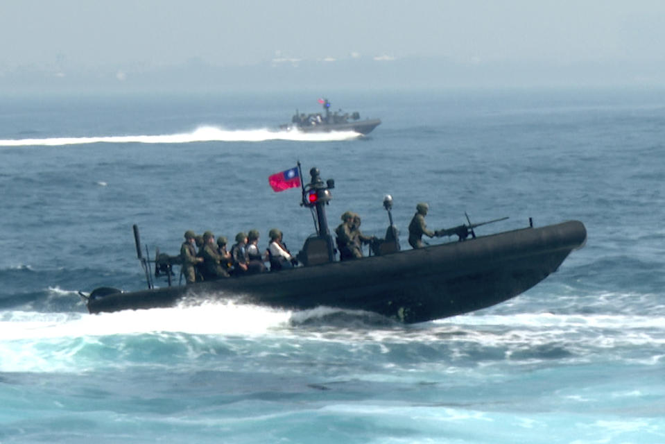 In this image taken from video, Taiwanese assault boats take part in naval drills in Kaohsiung, Southern Taiwan, Wednesday, Jan. 31, 2024. Taiwan is holding spring military drills following its recent presidential election and amid threats from China, which claims the island as its own territory that it is determined to annex, possibly by force. (AP Photo/Johnson Lai)