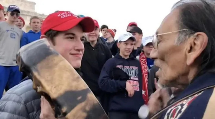 An image captured from one of the videos posted on social media showed Covington Catholic’s Nicholas Sandmann standing face to face with Native American elder Nathan Phillips in January 2019.