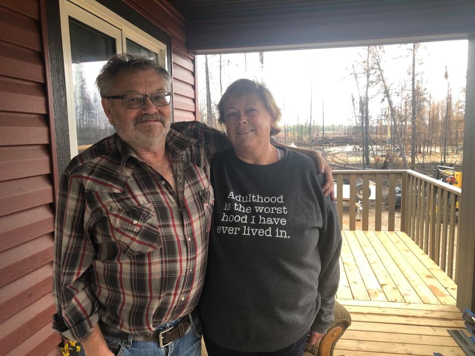Pat and Evelyn Coleman were one of the lucky ones in Enterprise who were able to return to a home left untouched by the flames.