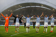 Soccer Football - Premier League - Huddersfield Town vs Manchester United - John Smith's Stadium, Huddersfield, Britain - October 21, 2017 Huddersfield Town’s Jonas Lossl, Laurent Depoitre, Steve Mounie, Christopher Schindler and Mathias Jorgensen celebrate in front of the fans at the end of the match Action Images via Reuters/Ed Sykes