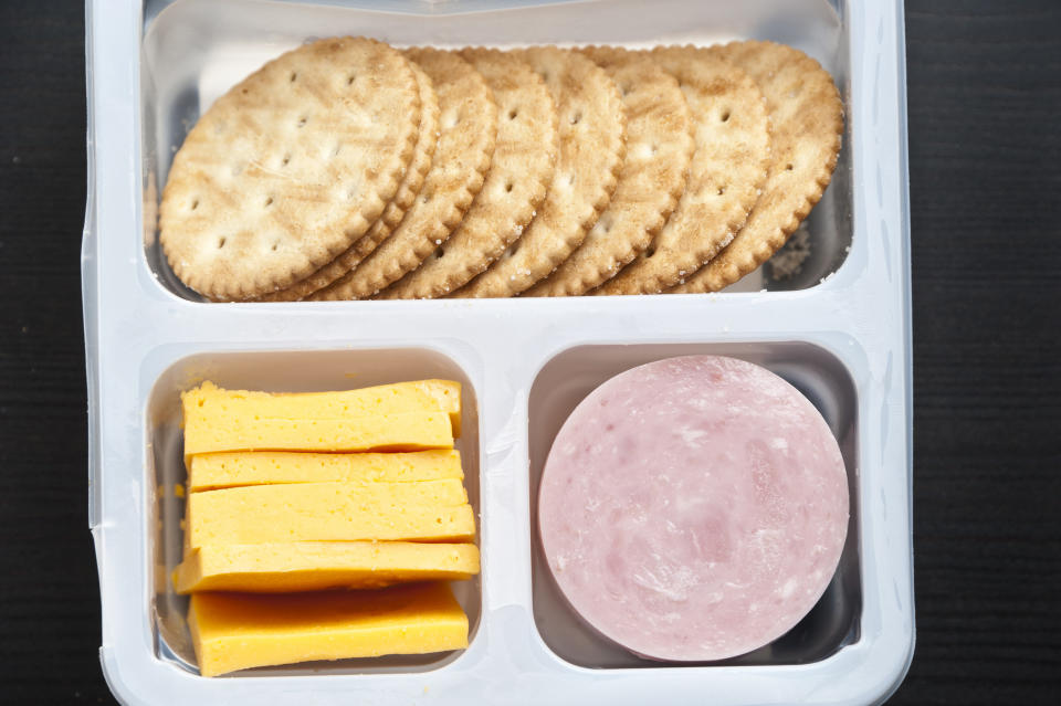 A Lunchable with cheese and Bologna.