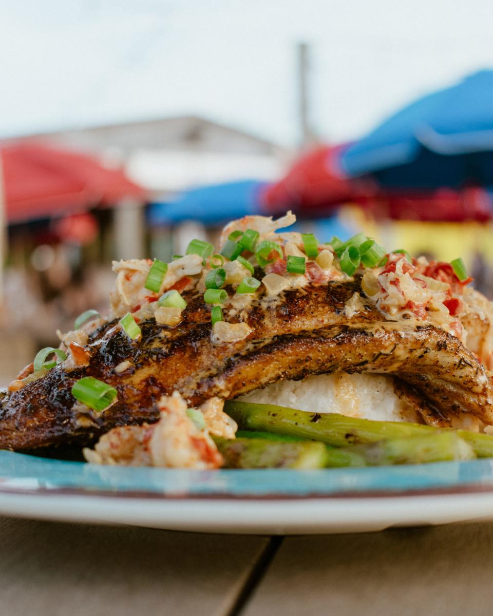 Pensacola Beach's Red Fish Blue Fish is back open for business seven days a week with a fresh look, menu and schedule.