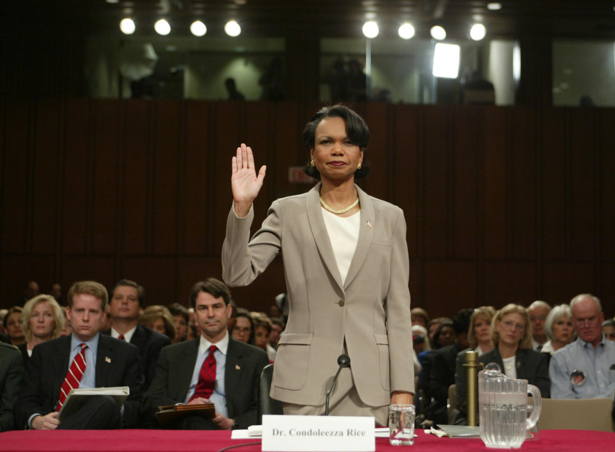 Condoleezza Rice raises her right hand as she is sworn in to testify before the 9/11 Commission.