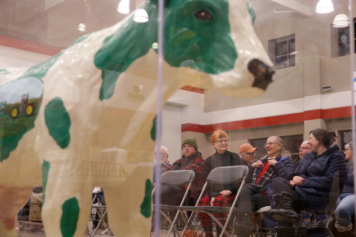 Iowans participate in the caucus Monday at Stutsman Retail Center in Hills.