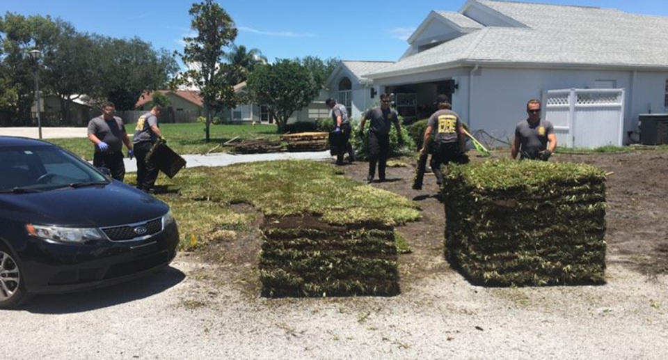 After Mr Work was safely transported to the hospital, seven workers returned to help finish laying the lawn. Source: Facebook/Melissa Ann Work