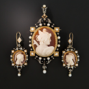 <p><strong>Lang Antiques</strong></p><p>langantiques.com</p><p><a href="https://www.langantiques.com/vintage-jewelry/pins-and-brooches/victorian-hardstone-cameo-pendant-brooch-and-earrings-set.html" rel="nofollow noopener" target="_blank" data-ylk="slk:Discover;elm:context_link;itc:0;sec:content-canvas" class="link ">Discover</a></p><p>Roman centurions in sharp relief against carnelian backdrops give this set a striking look. Rose-cut diamonds and natural pearls set in 18-karat rose gold surround the cameos, lending a more decorative lean. </p>