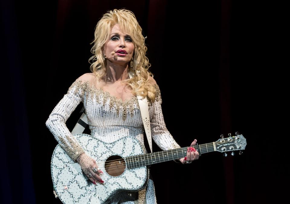 PHILADELPHIA, PA - JUNE 15:  Singer-songwriter, actress, author, businesswoman Dolly Parton performs during Dolly Parton Pure & Simple Tour at Mann Center For Performing Arts on June 15, 2016 in Philadelphia, Pennsylvania.  (Photo by Gilbert Carrasquillo/Getty Images)