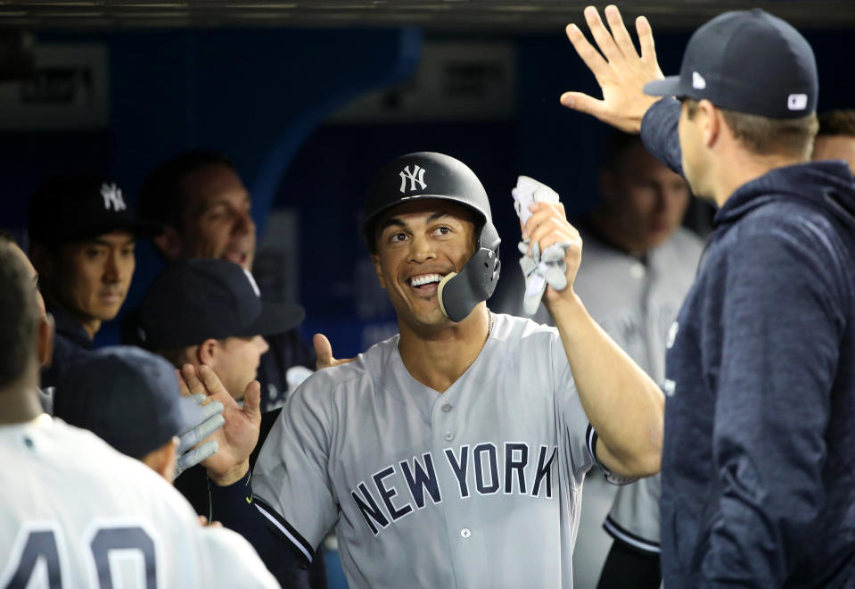 Giancarlo Stanton's debut was everything Yankees fans could have hoped for. (Tom Szczerbowski/Getty Images)