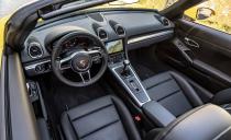<p>The simplicity of the 718's cabin belies its price yet telegraphs its intent. The stand­ard sport seats compensate for their limited adjustability by cradling passengers in all the right places when the road dances.</p>