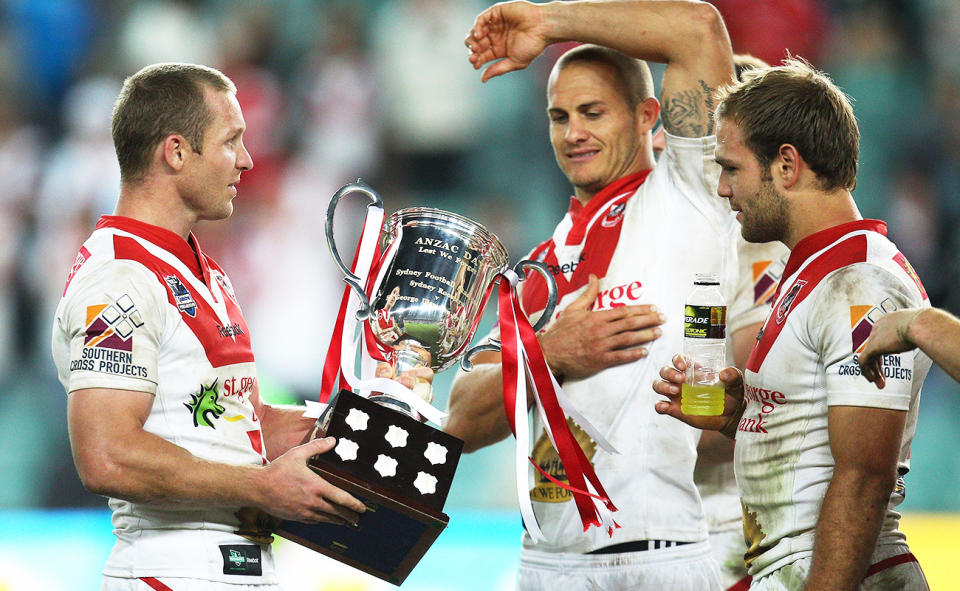 Matt Cooper, pictured here with Ben Hornby and Jason Nightingale after the Anzac Day game in 2010.