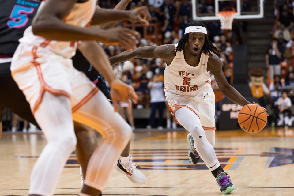UTEP's Tae Hardy (2) dribbles the ball at a game against FAU on Saturday, Jan. 21, 2023, at the Don Haskins Center in El Paso, Texas.
