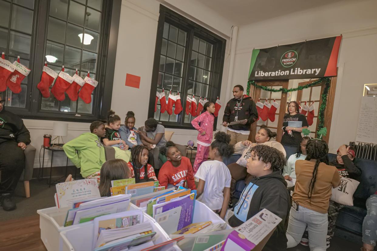 Students from the 1619 Freedom School during the school's holiday party.