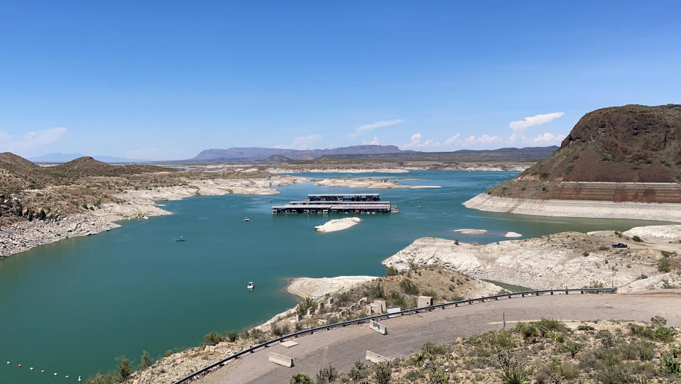 FILE - Low water levels are seen at Elephant Butte Reservoir near Truth or Consequences, N.M., on July 10, 2021. Reservoirs around New Mexico have been reduced to record low levels as the state enters its third straight year of drought. A U.S. judge serving as special master in a legal battle over management of one of North America's longest rivers has cleared the way for a proposed settlement to be made public. Under an order issued Friday, Dec. 30, 2022, the proposal reached by Texas, New Mexico and Colorado will be released in early January 2023 as attorneys prepare for an upcoming hearing on the merits of the proposal. (AP Photo/Susan Montoya Bryan, File)